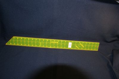A 24 in LONG RULER WITH MITRED END